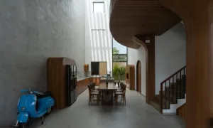 Nhà 160 m2 cho ba thế hệ lấy cảm hứng từ đường cong của xe cổ